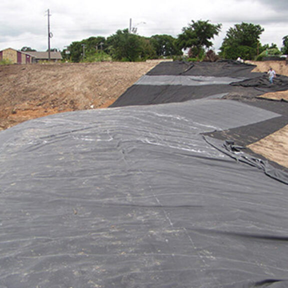 EPDM liner conforming the round, curving earth.