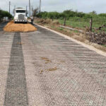 Large equipment driving on InterAx reinforced with aggregate