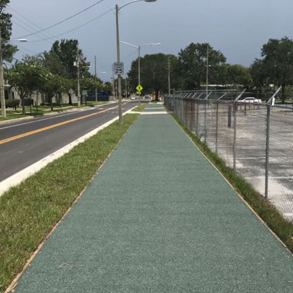 Shock absorbant and long-lasting Porous Pave used on a walking path as an alternative to pavement