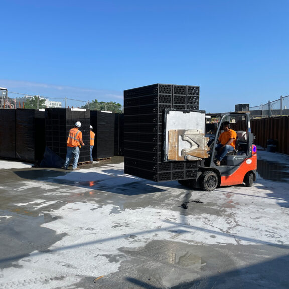 Onsite delivery of the modular underground stormwater retainment system, R-Tank.