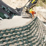 A terraced retaining wall structure that supports vegetation and prevents erosion.