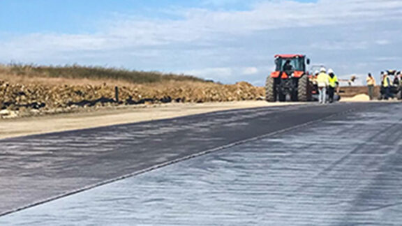 Enhancing Eagles Canyon Raceway's Pavement with Mirafi H2Ri pavement solutions.