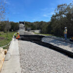 Installing Presto Geoweb over aggregate to stabilize the evacuation road.